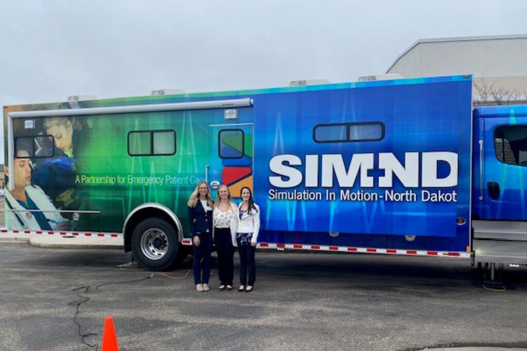 Students in front of simulator truck
