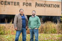 Lanny LaPlante (left) of the Cheyenne River Reservation in South Dakota, applied to UND’s new Veterans Entrepreneurship Program (VEP) to get more hands-on learning and professional advice on growing his current start-up venture, Blue Star, Inc., which installs navigation aids and lighting systems for airports. The VEP is a three-part program that prepares disabled vets to enter the world of business. Tyler Okerlund (right) is the director of UND’s VEP. Photo by Tyler Ingham.