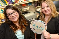 Part of that success is of UND’s Recruitment/Retention of American Indians into Nursing (RAIN) program is that it’s a home away from home for its students and alums, according to Elle Hoselton (left), a RAIN alumna who, like Sonya Anderson (right), came back to UND to mentor students in the program. Photo by Jackie Lorentz.