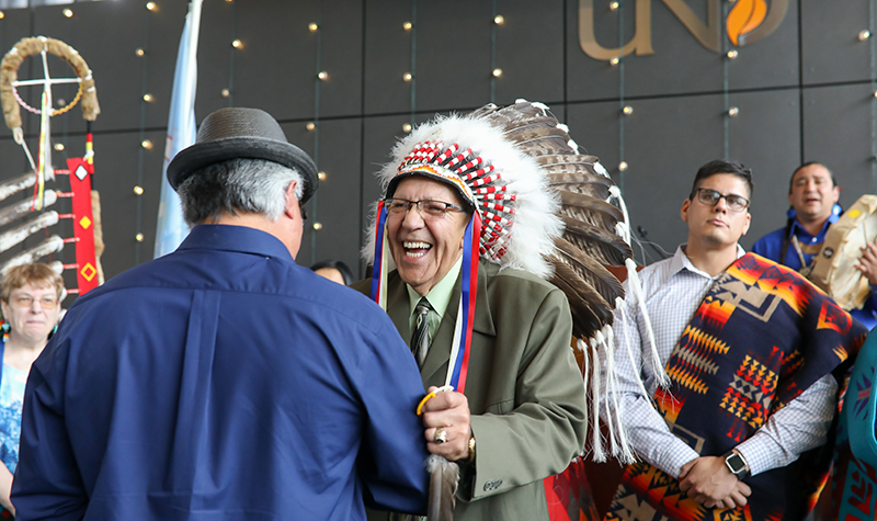 It was fond farewells all around for Leigh Jeanotte, longtime UND director of American Indian Student Services, on Monday, June 26. Jeanotte said good-bye to colleagues and other friends as he prepared for retirement after 43 years at UND. Photo by Shawna Schill.