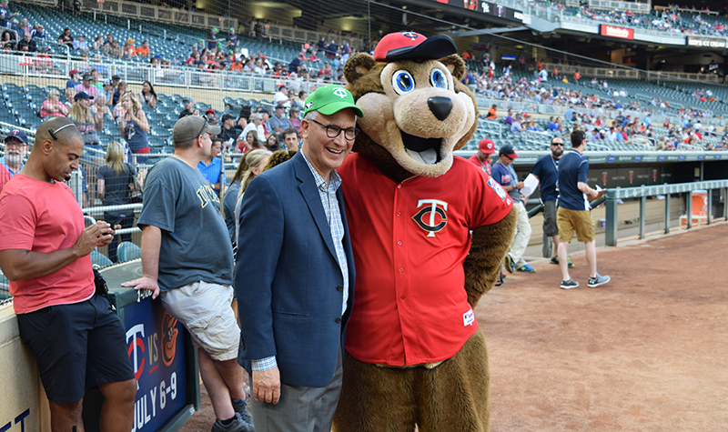 UND President Mark Kennedy and T.C. Bear get ready for the start of the Twins’ game against the Baltimore Orioles on Friday, July 7.