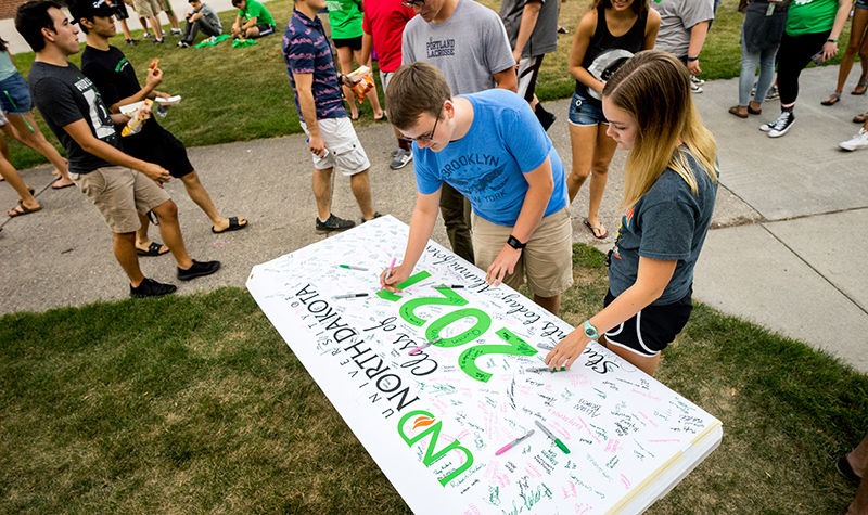 According to UND's official fourth-week enrollment figures, the number of new freshmen at UND rose from 1,928 to 1,939, a growth of nearly 1 percent from last fall. UND’s transfer students are up 5 percent from last year, and those seeking professional degrees have risen 4 percent.  Photo by Tyler Ingham.