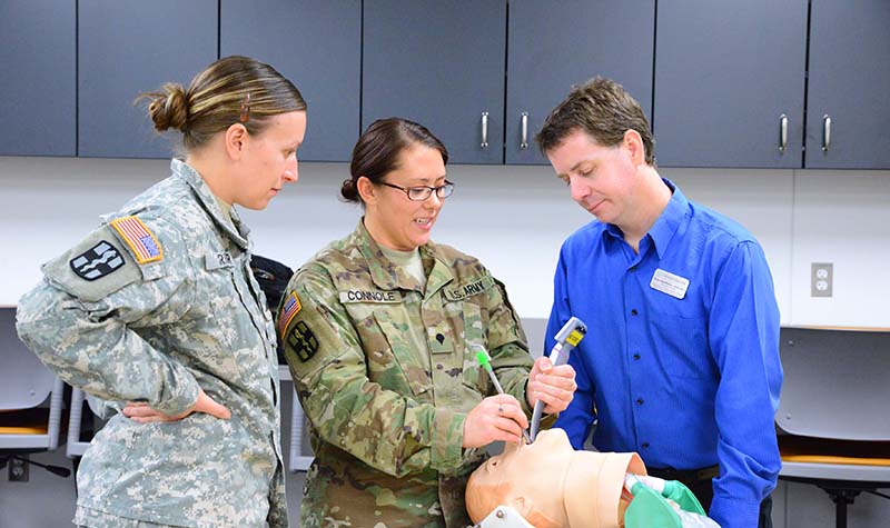 Members of the North Dakota National Guard Delta Company 1-112th Aviation Battalion, based in Fargo, recently took advantage of realistic training by officials with UND's physician assistant program and the Simulation Center, housed with in the School of Medicine & Health Sciences. Images courtesy of the SMHS.