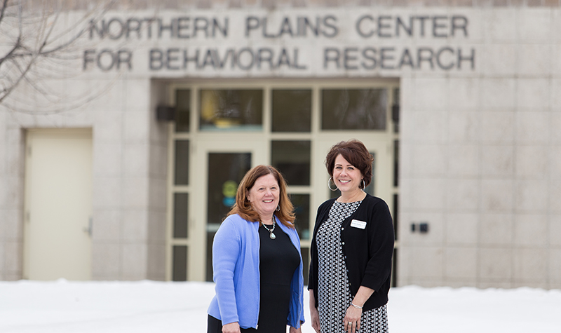 Thomasine Heitkamp, professor in the UND College of Nursing & Professional Disciplines, recently has drawn nearly $8 million in federal grants for UND's efforts to bolster mental health services and combat opioid addiction in rural America.Heitkamp is teaming with fellow UND scholars, such as Meridee Schogren (right), a clinical associate professor of nursing, and others to help administer the training to more mental health providers in rural communities across much of the Great Plains. Photo by Tyler Ingham/UND Today.