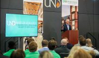 In front of a large audience at the Gorecki Alumni Center, Werner Nistler made remarks following an "overwhelming" celebration of his and his wife's contribution to a new building for the Nistler College of Business & Public Administration. Photo by Shawna Schill/UND Today.