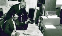 Richard Beringer (seated) and the late D. Jerome Tweton were both named Chester Fritz Distinguished Professors of History. Archival image.
