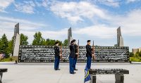 A UND ROTC unit presents arms during the dedication in September of the new Veterans Memorial Park in Grand Forks. Photo by Shawna Schill/UND Today.