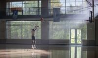 A UND basketball player practices alone on a fall day. UND archival photo.