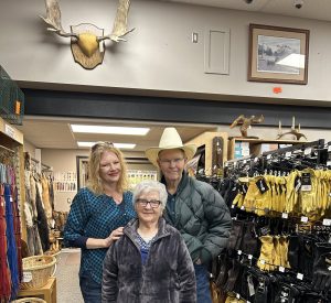 owners standing in the middle of the store