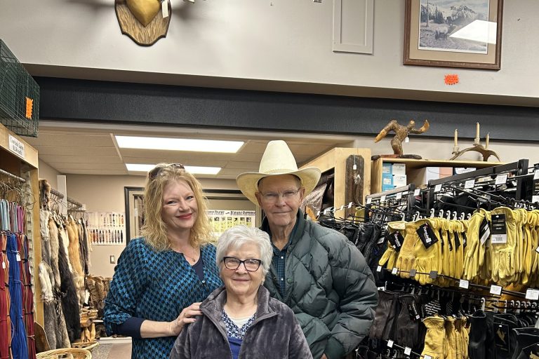owners standing in the middle of the store
