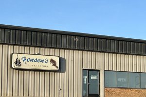 photo of outside of the building with signage