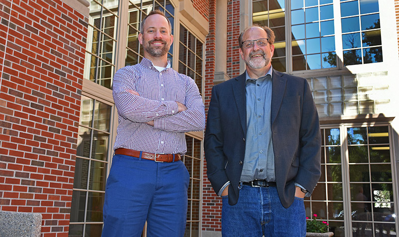 Charlie Gorecki, left, CEO of the UND Energy & Environmental Research Center, and Tom Erickson, director of the State Energy Research Center, are pursuing their Ph.D. degrees under a University initiative to provide continuing education opportunities for employees