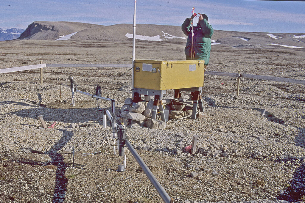 Jaakko Putkonen, associate professor of geology at UND’s Harold Hamm School of Geology and Geological Engineering, adjusts equipment in Spitsbergen, Norway.