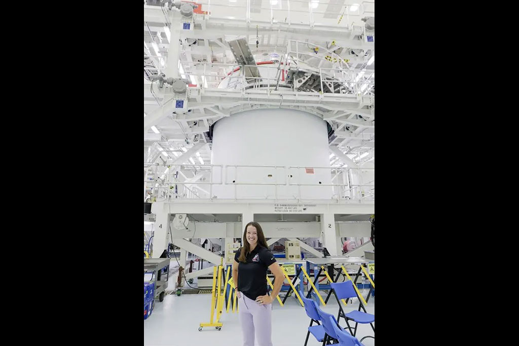 A person stands inside of a NASA facility located in Florida.