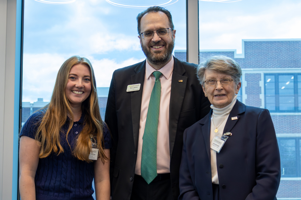 Student Autumn Bergum poses with CEM Dean Ryan Adams and donor Joyce Medalen at the CEM Scholarship Ceremony.