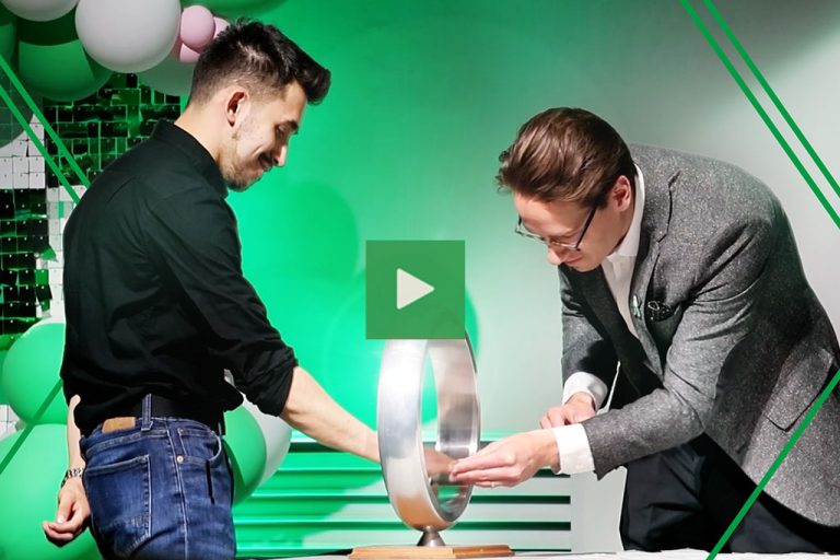 A video thumbnail features a student putting their hand through a ceremonial steel ring as an engineering faculty member places a symbolic ring on their pinky finger.
