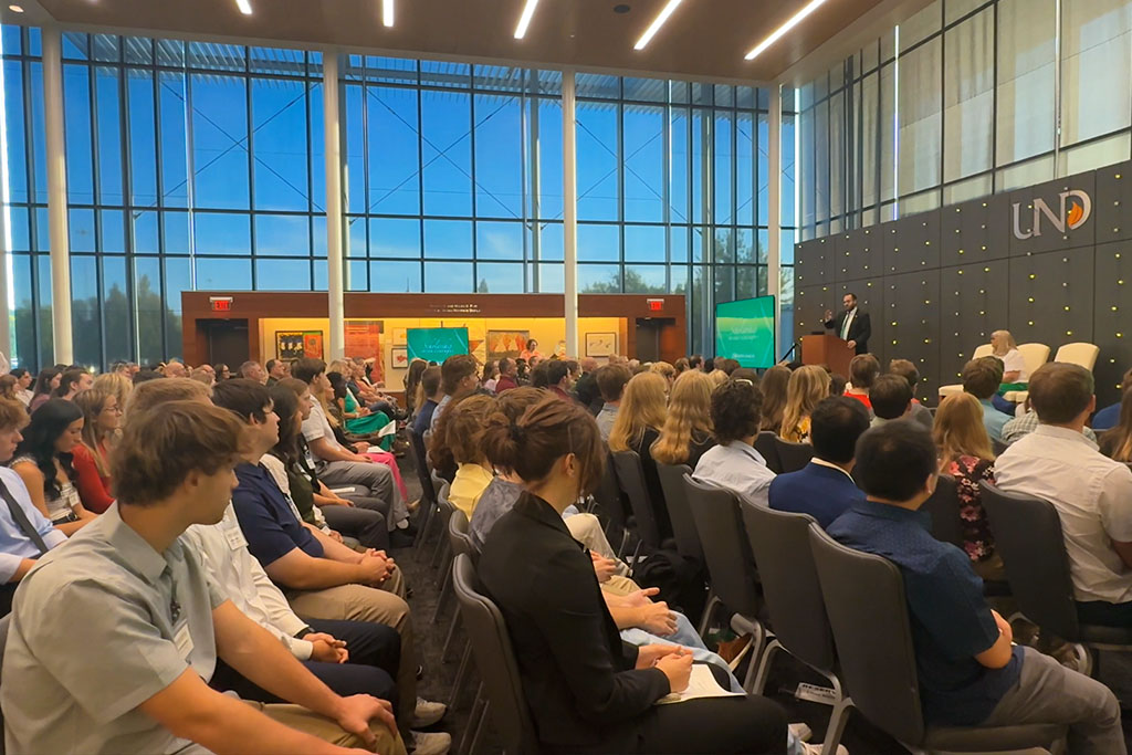 The UND Alumni Association & Foundation's Gransberg Community Room filled with two hundred attendees for an event.