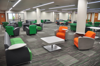 New chairs, tables, and couches in the 2nd floor study space