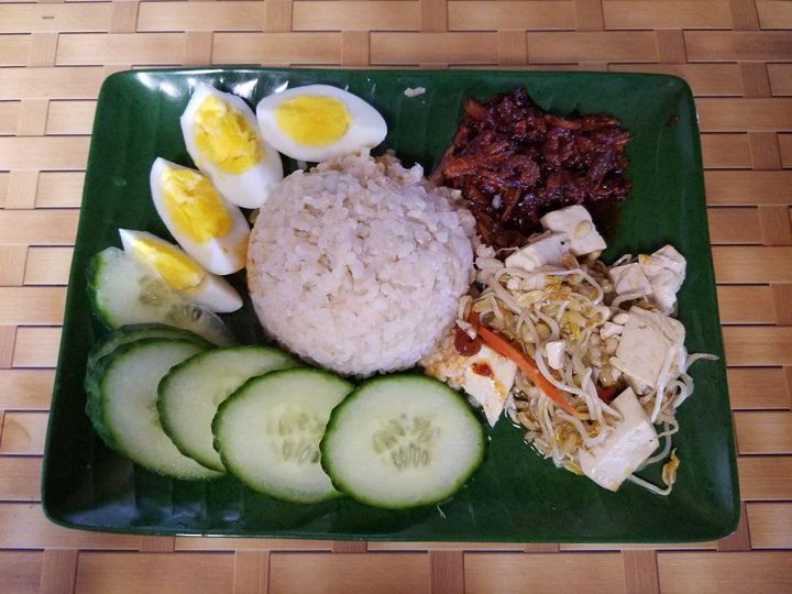 a plate of traditional Malaysian foods