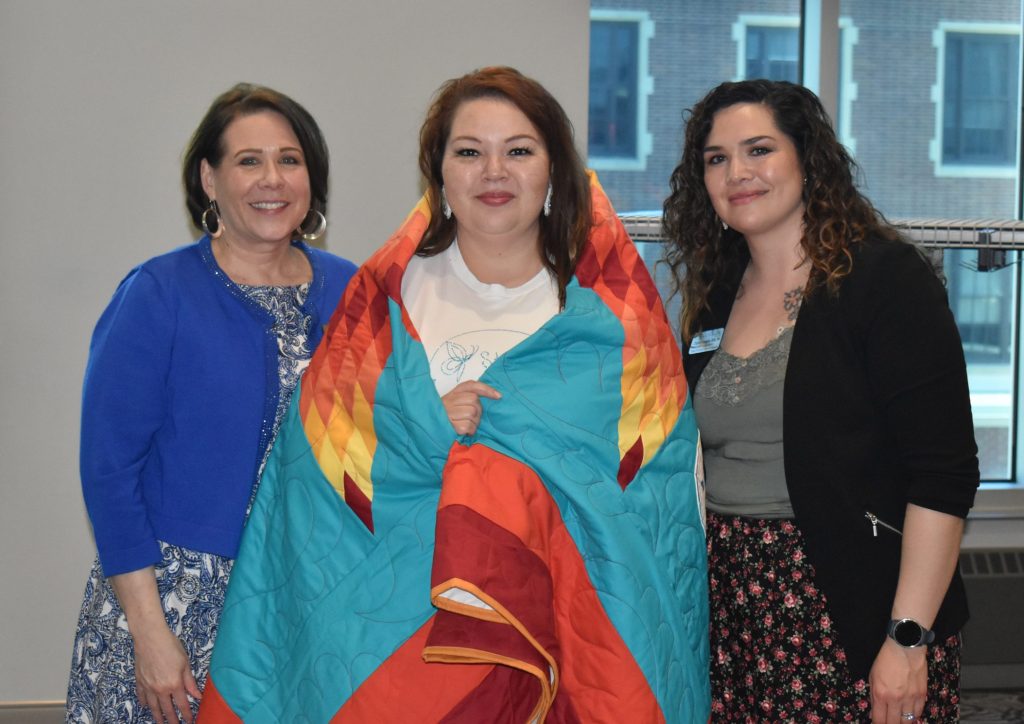 A group of women posing for a photo