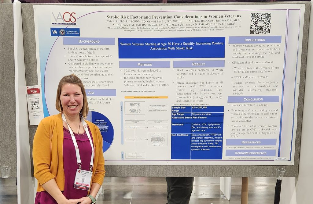 Dr. Renee Colsch standing in front of her research poster