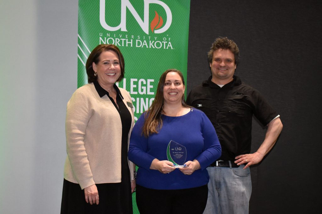 Dr. Jennifer Schlinger receiving her award