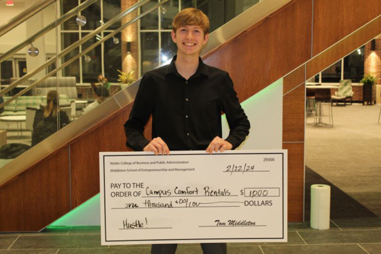 Micah Bruggeman wins $1,000 at the Middleton 2-Minute Pitch Competition.
