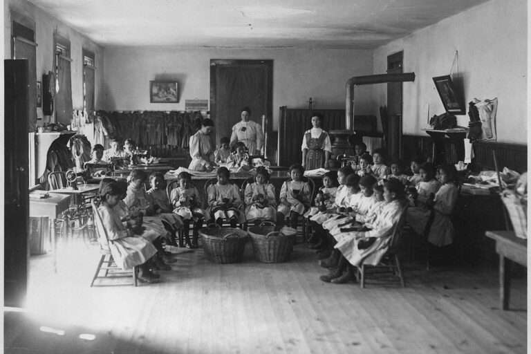Children in boarding school classroom