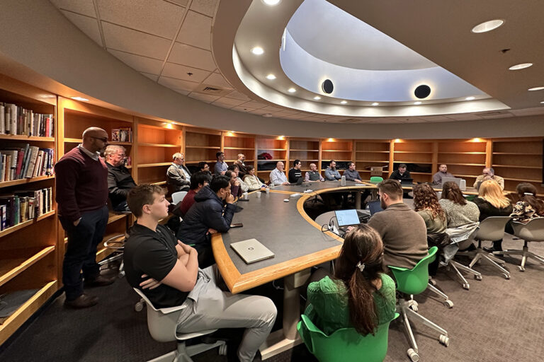 UND Biomedical engineering students and faculty members conduct a group discussion