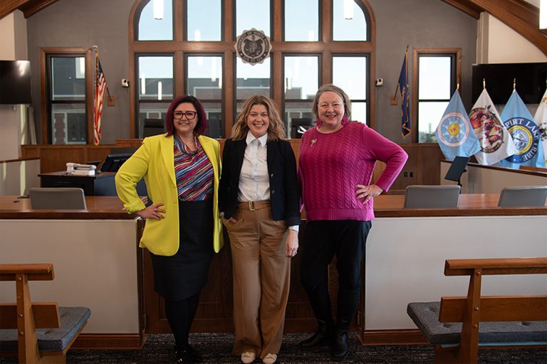Right to left: Professors Carolyn Williams, Jennifer Cook, and Kimberly Dasse in the Gerald W. VandeWalle Courtroom at UND School of Law.