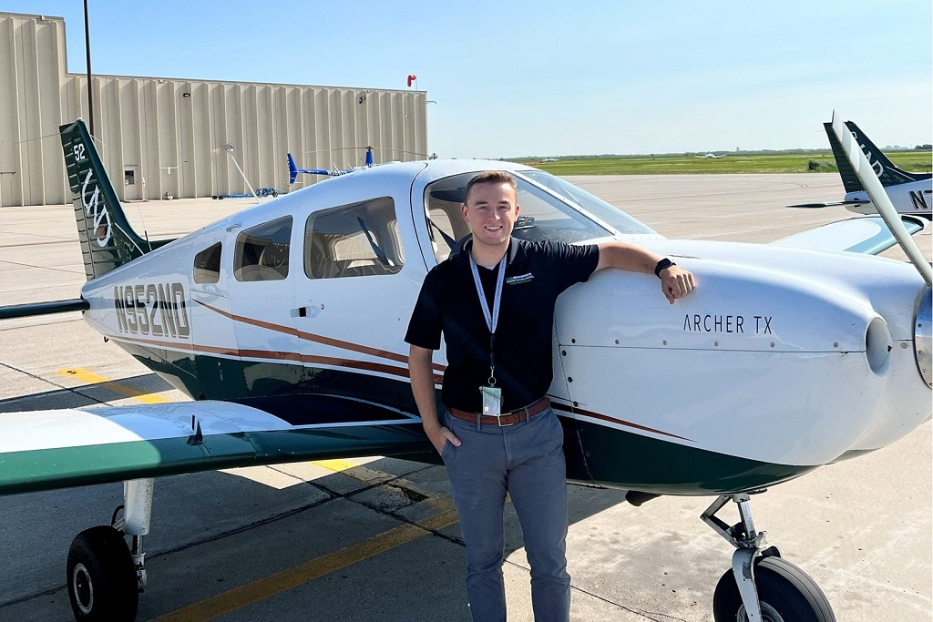 UND flight instructor standing by aircraft