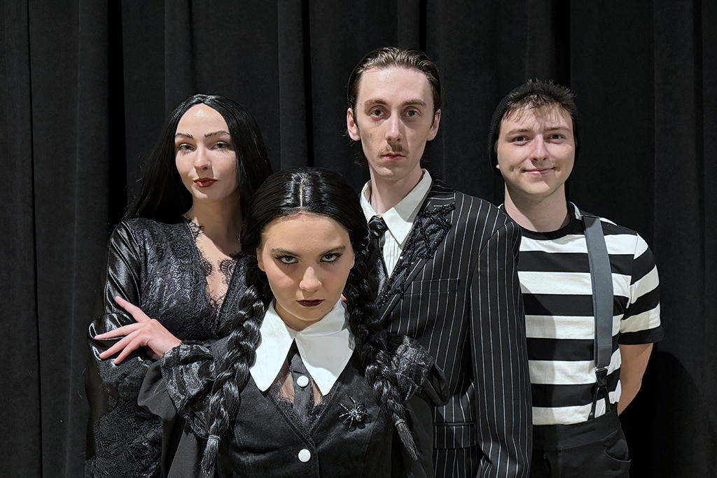 Madi Watts (from left) as Morticia Addams, Isabella Voller as Wednesday Addams, Blake Storbakken as Gomez Addams and Earmonn Smith as Pugsley Addams