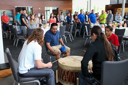 American Indian musicians play an honor song Monday, June 6, at the Nurturing American Tribal Undergraduate Research Education (NATURE) opening ceremony at the Gorecki Alumni Center. Photo by Jackie Lorentz.