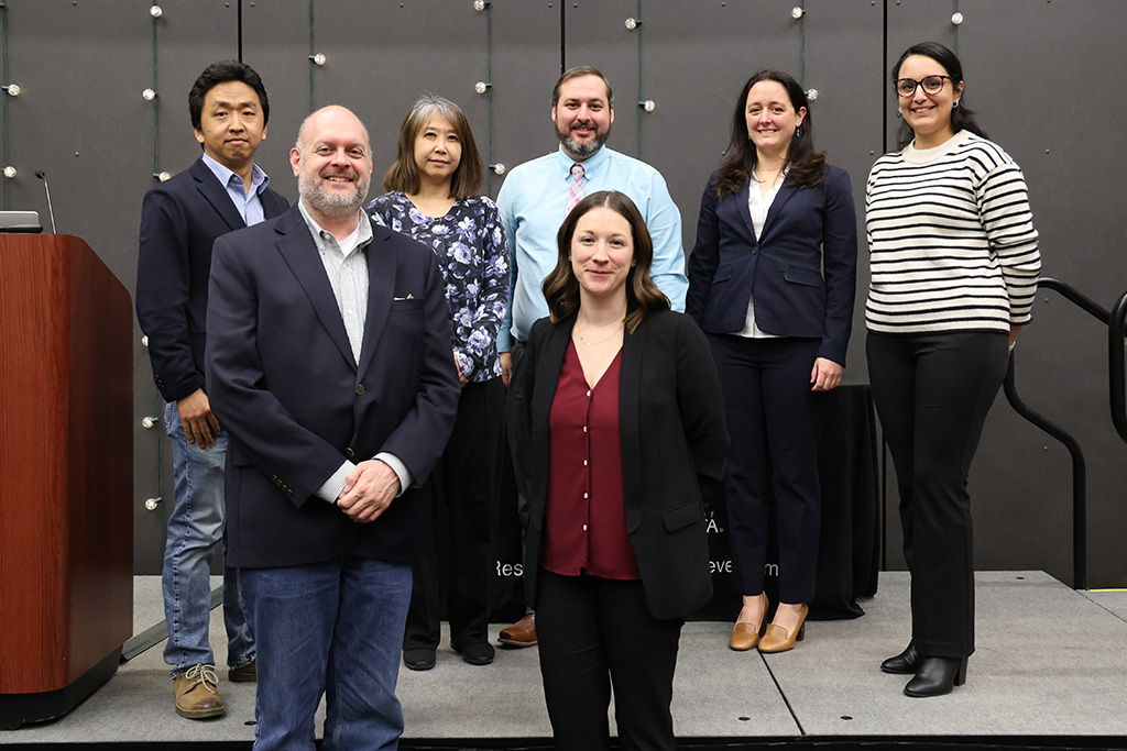 The first cohort of the Early Career Scholars Program. (Clockwise from back left) Bo Liang, Kumi Nagamoto-Combs, Jared Marquis, Hallie Chelmo, Marwa Majdi, Kimberly Schweitzer and Dan Lewerenz.