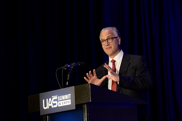 President Mark R. Kennedy addresses the 10th Annual UAS Summit & Expo in Grand Forks. Photo by Jackie Lorentz.