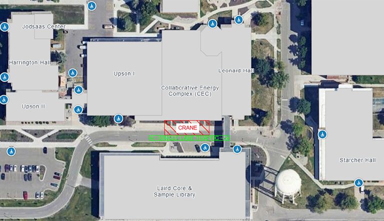Map view of Campus Road and work area near Collaborative Energy Complex. Red box marks crane position and green line marks traffic flow.