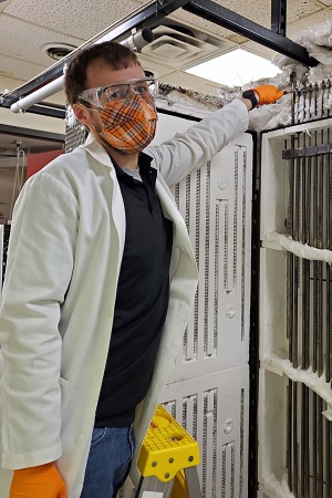 Ian Foerster, a Ph.D. student in chemical engineering from Pekin, N.D., will work on the DOE jet fuel project as a post-doctoral associate after he graduates in December. He will design, build and operate bench-scale and engineering-scale reaction systems. Photo courtesy College of Engineering and Mines.