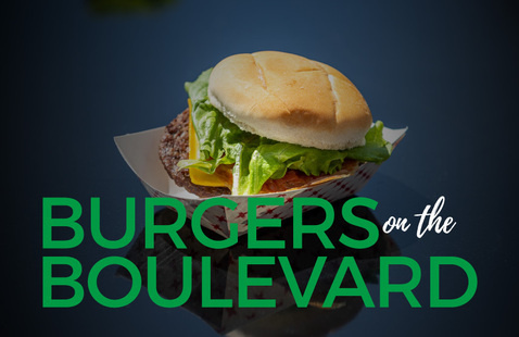 Burger in background with text: Burgers on the Boulevard