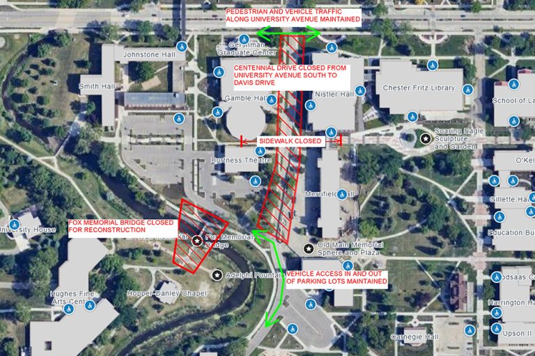 Campus map centered on Centennial Drive with red hashes showing the closure area from University Avenue to Davis Drive. Red hashes also cover the area of Fox Memorial Bridge, signifying its closure. Green arrows along University Avenue and Davis Drive signify that those streets will remain open.