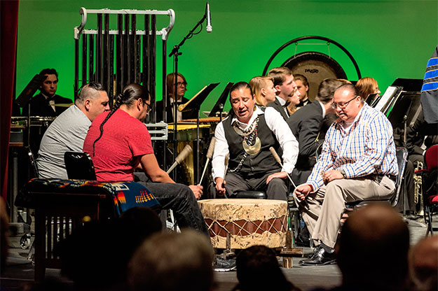 An American Indian drum group performs the Honor Song for UND President Mark Kennedy's inauguration ceremony