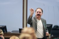UND Assistant Professor of Sociology Frank White teaches "Drugs and Society" to a packed classroom each semester. The class size has grown through topic interest and Frank's signature teaching style.  Photo by Shawna Schill.