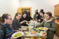 Members of the UND community take time to dish up lunch at the Taste of Faith event, held Friday, Feb. 3, at Christus Rex church on campus. The event capped off Interfaith Week celebration at UND. Photo by Tyler Ingham.