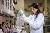 UND graduate student Mona Sohrabi conducts biomedical research in Dr. Colin Combs' lab in the School of Medicine & Health Sciences' Department of Biomedical Sciences. UND archival photo.