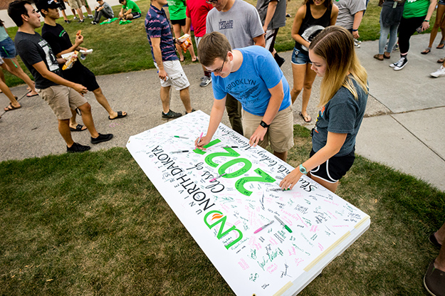 According to UND's official fourth-week enrollment figures, the number of new freshmen at UND rose from 1,928 to 1,939, a growth of nearly 1 percent from last fall. UND’s transfer students are up 5 percent from last year, and those seeking professional degrees have risen 4 percent. Photo by Tyler Ingham.