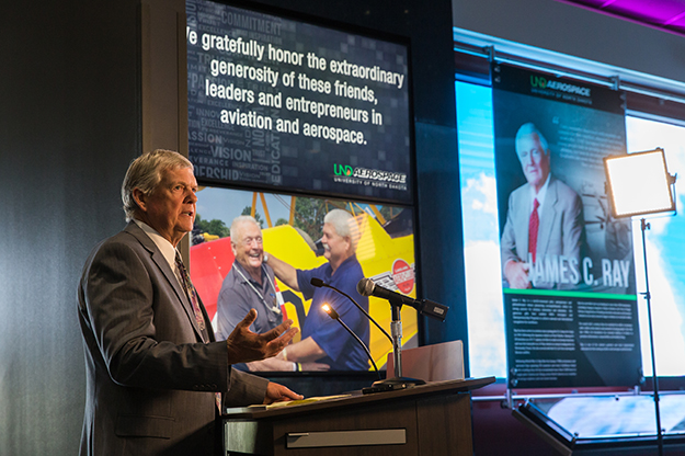 Larry Martin, chair of UND Aerospace Foundation, announces a $1.5 million scholarship endowment to honor the memory of UND benefactor James C. Ray