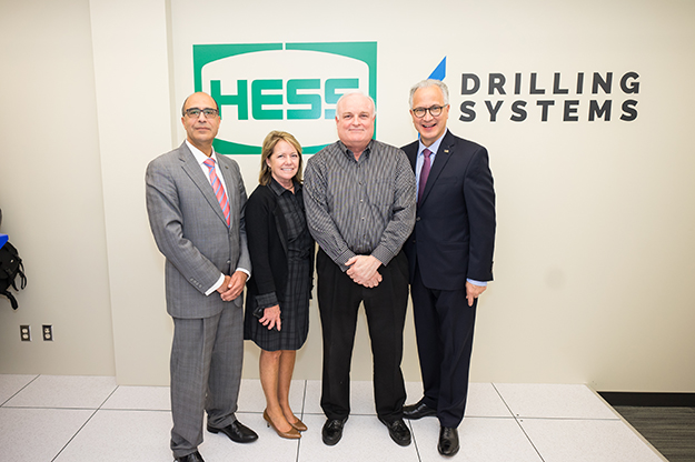 (left to right) Hesham El Rewini, dean of the UND College of Engineering &amp; Mines, Kathy Neset, chair of the North Dakota State Board of Higher Education and president of Neset Consulting Services in the Bakken Oil Patch; Will Lehman, director of geological science and engineering development for Hess Corporation in Houston, and UND President Mark Kennedy. Photo by Tyler Ingham.y