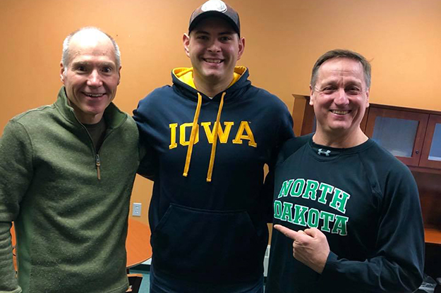 Schaeffer visits with longtime former UND Television Center employees, Barry Brode (left) and Marv Leier at the UND Television Center studio recently. Image courtesy of Jon Schaeffer.