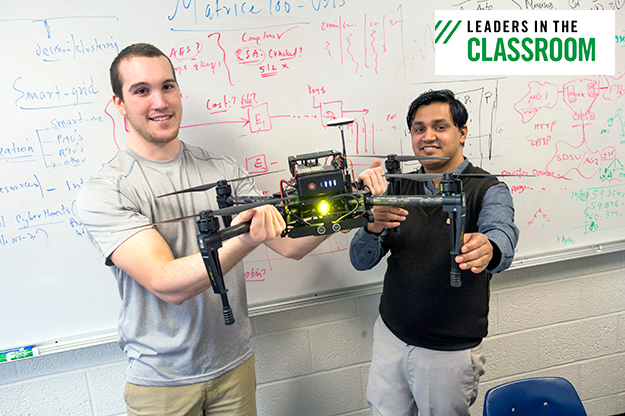 Prakash Ranganathan and former student Eric Horton demonstrate a drone. Photo by Jackie Lorentz/UND Today