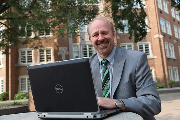 Psychology faculty member Jeff Holm is serving as vice provost for online education and strategic planning. One of his goals is to grow UND's online offerings. Photo by Connor Murphy/UND Today.