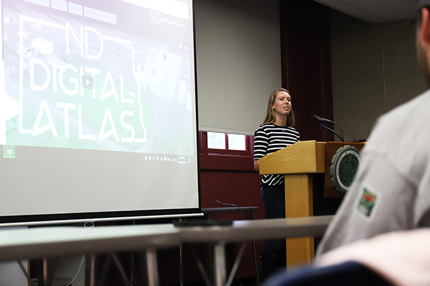 Phoebe Eichhorst, a senior, represented over 150 undergraduate researchers who have contributed to the North Dakota Digital Atlas since 2014. Eichhorst's contribution involved mapping food exports from the state. Photo by Connor Murphy/UND Today.